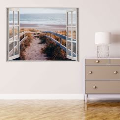 Fen&ecirc;tre avec vue sur une dune et la mer
