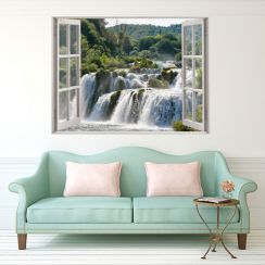 Fen&ecirc;tre avec vue sur une cascade d'eau