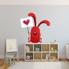 Lapin rouge avec sa pancarte